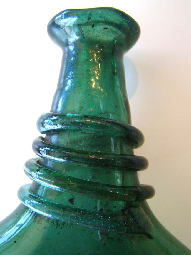 A wonderful late 18th or early 19th century hand blown Persian Saddle Flask — image 3